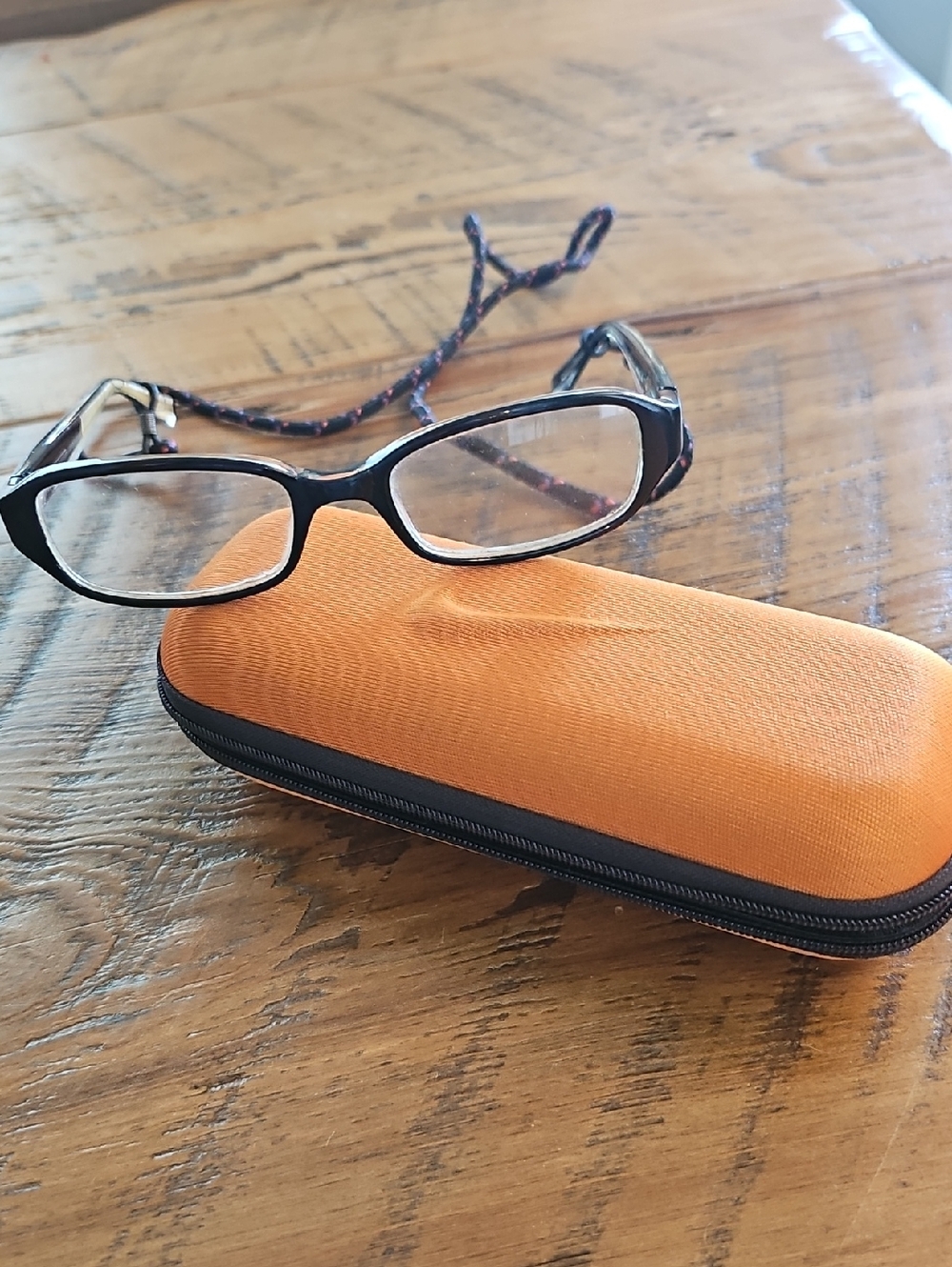 Nike Glasses with Patterned Cord and Orange Hard Case